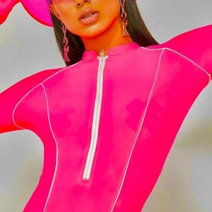 Neon pink body suit